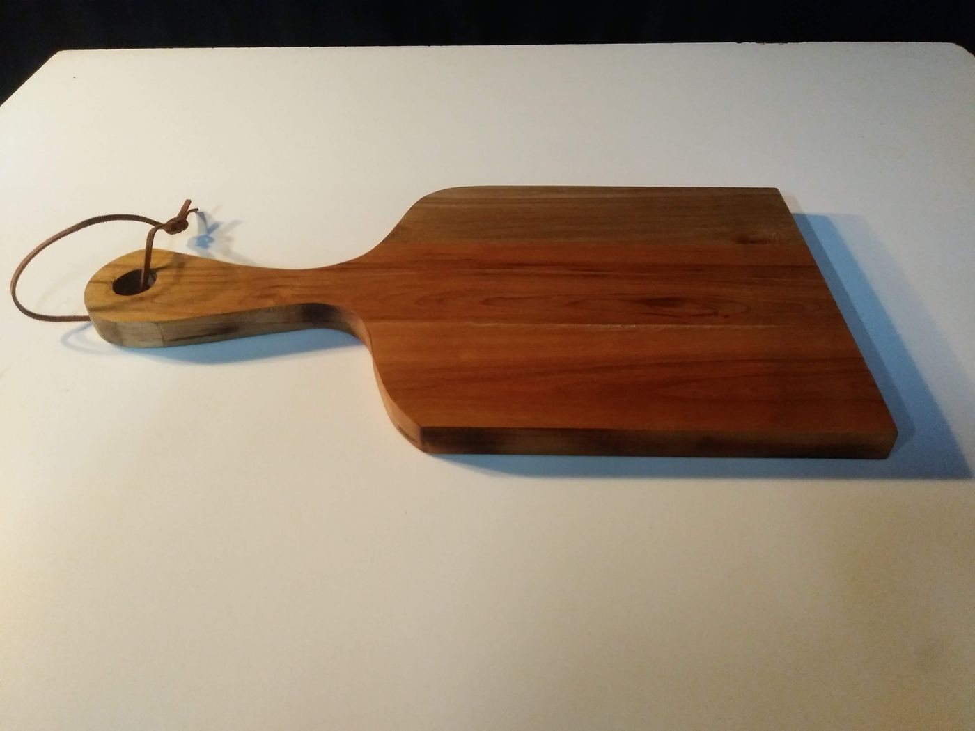Planche de service à poignée